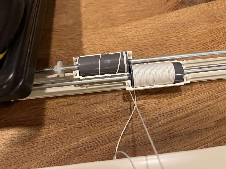 Top bar spool wrapped, bottom bar starting.